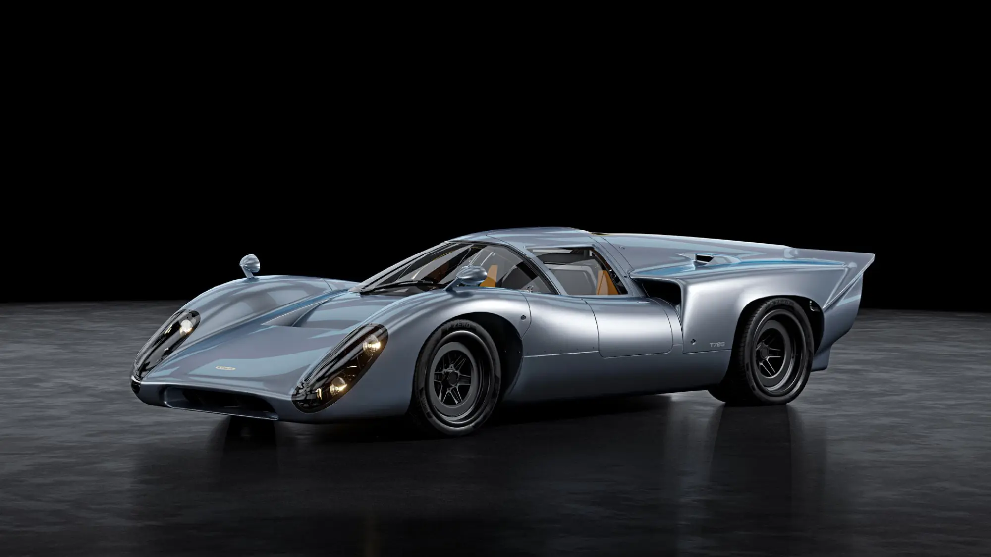 Image of a grey Lola T70S GT, viewed from the front left three quarters